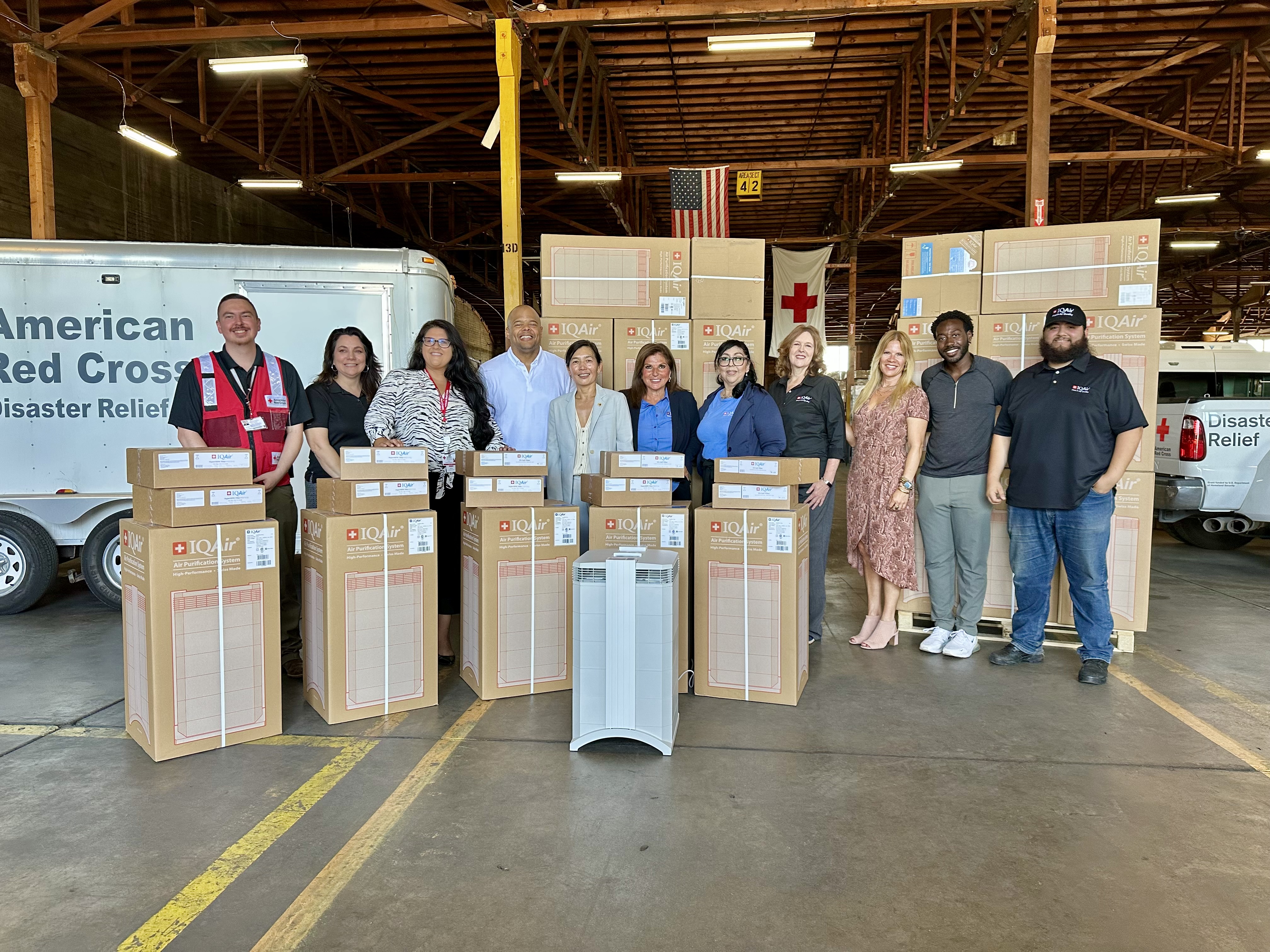 South Coast AQMD, IQAir Foundation, and American Red Cross staff deploy 183 portable air cleaners to the American Red Cross warehouse in Bell, California